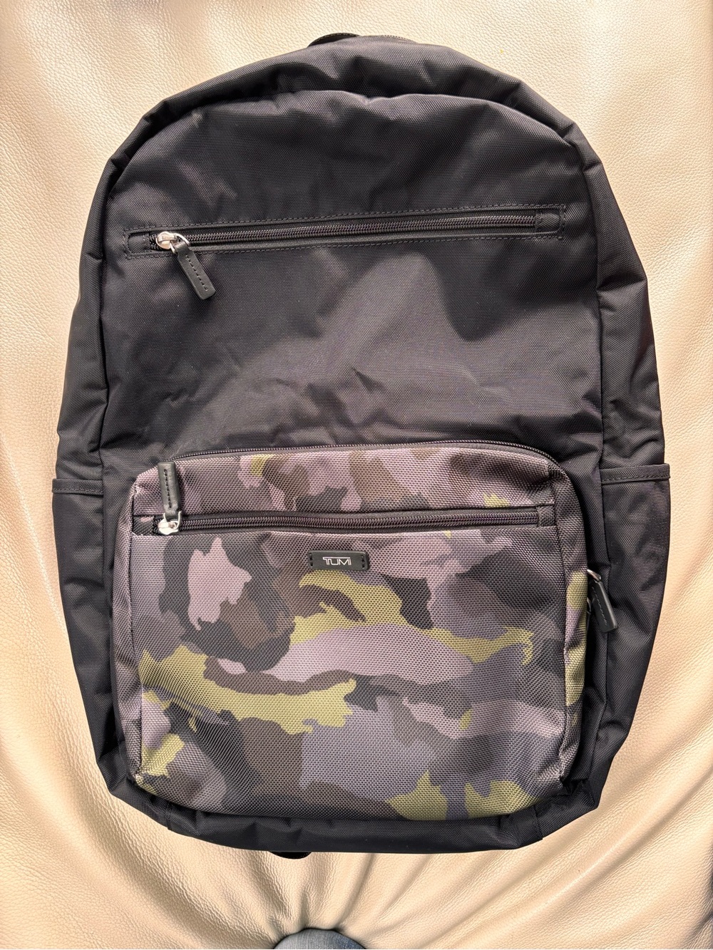 Tumi Black Backpack with Olive and Gray Camo Front Pocket